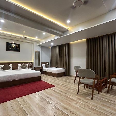 Hotel Holiday Icon Dwārka المظهر الخارجي الصورة